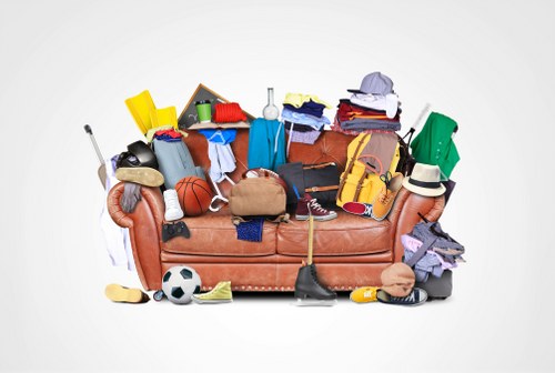 Homeowner planning loft decluttering in Weybridge